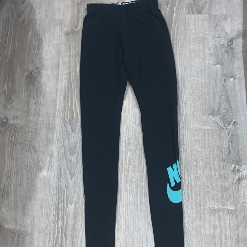 Black Nike Leggings with blue nike on the side